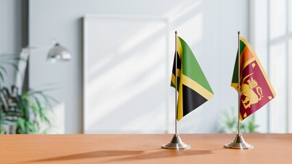 FLAGS OF JAMAICA AND SRI LANKA ON TABLE