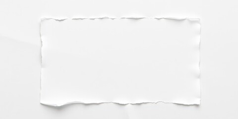 A close-up image of a torn white paper background with scattered bits and pieces, creating a texture perfect for graphic design projects or presentations, backdrop, art, creativity