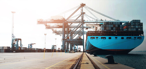 Distribution, dock and shipping with maritime vessel for export or import supply chain logistics. Boat, container and crane at harbor for delivery of commercial or international cargo and shipment