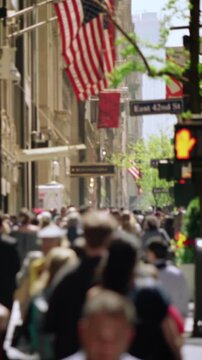 Crowded avenue. New York City. US. People walking in busy street of Manhattan. Traffic passing by. More options in my portfolio.