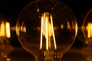 Light bulbs with big yellow filaments inside in vintage style