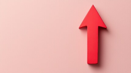 Red arrow pointing upwards on soft pink background, symbolizing growth and progress. This simple yet striking design can be used in various contexts