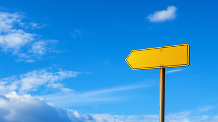 Simple  unmarked signpost against a bright blue sky  conveying open possibilities and travel destinations