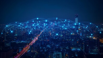 A panoramic view of a cityscape at night with glowing dots connected by lines, representing network connections.
