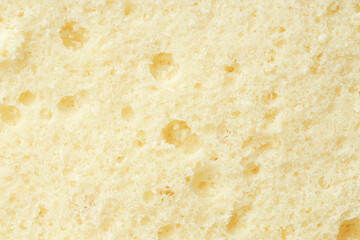 Tasty sponge cake as background, top view