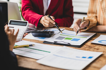 Business team meeting and financial advisor reviewing accounts and analyzing financial reports. Financial planning and business budgets. Auditor team working in office.