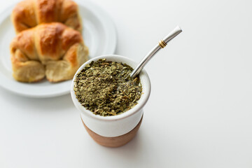 Yerba mate, a type of strong green tea, and argentinian croissants called medialunas