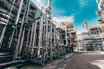 Fototapeta premium Valve elbow column refinery plant equipment for pipeline oil and gas valves at gas plant pressure safety