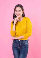 Photo of dreamy confident young woman wear yellow outfit looking empty space arms crossed smiling isolated pink color background	