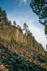 ‏Volcanic Hexagons rock formations in California’s Devil’s Postpiles National Monument. Incredible volcanic hexagons poles standing tall