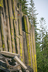 Close up shot of ‏Volcanic Hexagons rock formations in California’s Devil’s Postpiles National Monument. Incredible volcanic hexagons poles standing tall