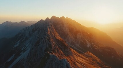 Obraz premium Golden Hour Over Majestic Mountain Range