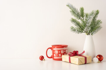 Festive Scandinavian Christmas side view scene featuring a wrapped gift, red ornament, and a pine...