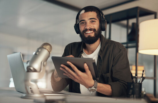 Podcast, portrait or man with tablet, microphone or radio host with communication in lounge. Online talk show, headphones or home with tech, podcaster or live stream with equipment or content creator