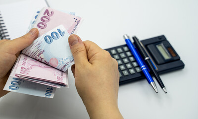 Turkish lira account. woman accountant.