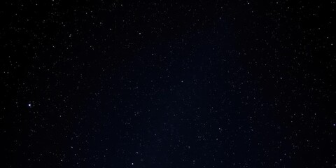 Fototapeta premium Stunning night sky with sparkling stars on black background, beautiful, peaceful, cosmic
