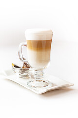 Сup of coffee with croissant on plate isolated on white background