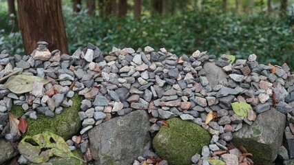 pebbles piled up while making a wish