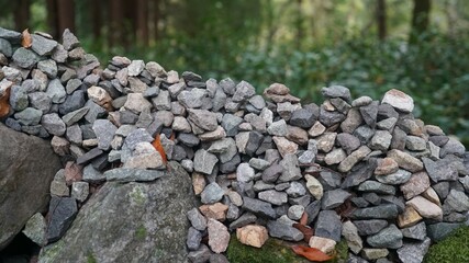 pebbles piled up while making a wish