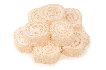 Coconut candy roll isolated on a white background.