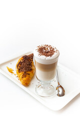 Сup of coffee with croissant on plate isolated on white background