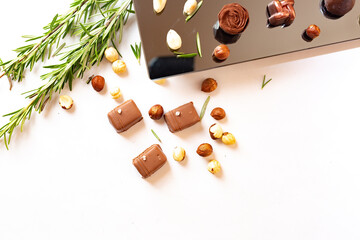 Assortment of chocolate candies sweets isolated on white background