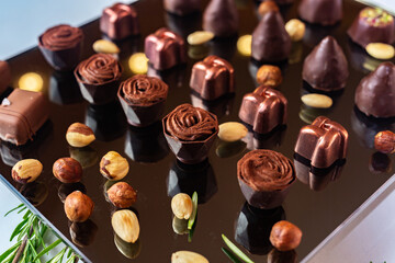 Assortment of chocolate candies sweets isolated on white background