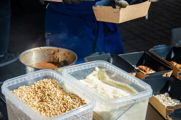 Food in food containers on a street stall