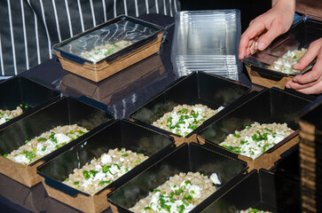 Food in food containers on a street stall