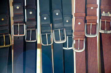 Leather goods , belts on the store counter