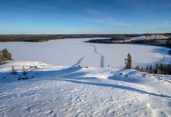 Naklejka premium Aerial view of the frozen Yellowknife River and Cinnamon Island at Yellowknife, Northwest Territories, Canada