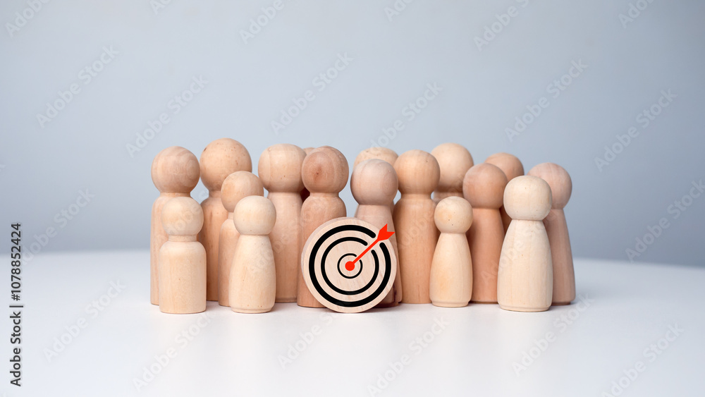 Aufkleber wooden dolls standing around dart board for creating and targeting business objectives. target conce