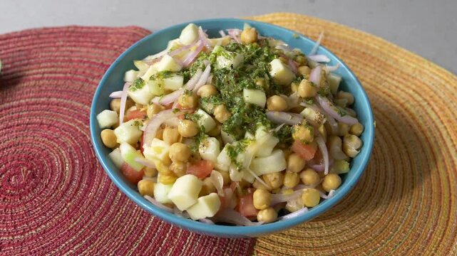 Chickpea Salad with Olives, Tomatoes, and Cheese, Featuring a Fresh and Colorful Blend of Ingredients, Perfect for a Healthy, Mediterranean-Inspired Dish Full of Flavor and Nutritional Goodness