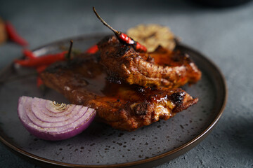 grilled juicy ribs with vegetables