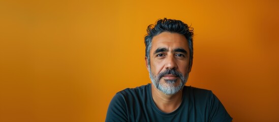 Studio portrait of a hispanic immigrant man / Latino immigrant