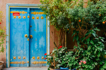 Brightly colored Uyghur-featured residential houses in the ancient city of Kashgar, Xinjiang, China