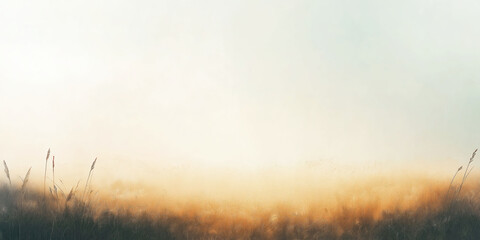Serene morning mist over tranquil meadow with soft golden hues