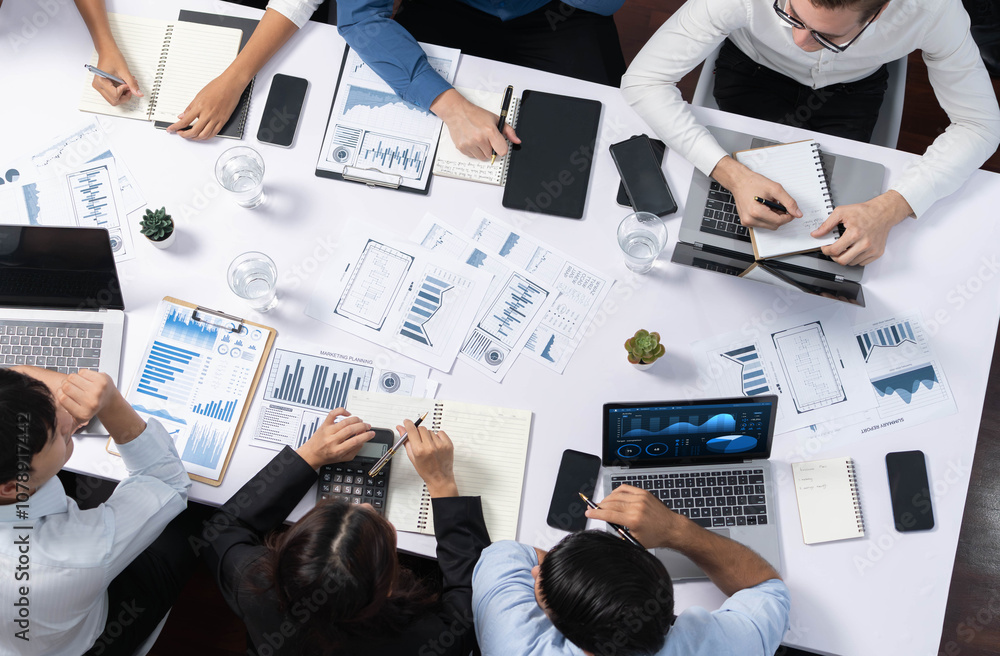 Poster top view analyst team utilizing bi fintech to analyze financial data at table in meeting room. analy