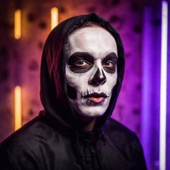 Caucasian male in a scary Halloween costume, captured in an extreme wide shot. skull make up on face, eerie costume, blur neon background