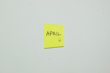 April sign on a sticky note.