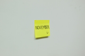 November sign on a sticky note.