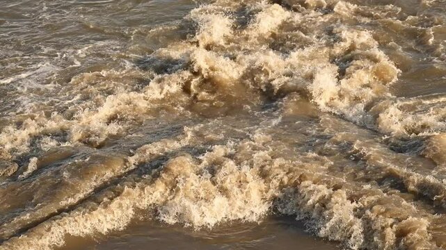 Sewage outfall on Danube river, 4K slow motion