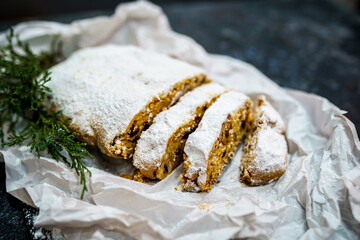 Sliced Traditional Stollen Dusting with Powdered Sugar