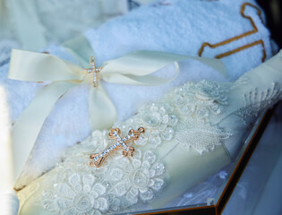 A gift set for the christening of a child. Candles, clothes and offerings. Caucasian traditions