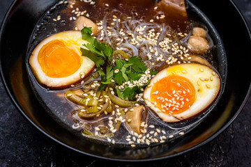 Japanese Ramen Soup with Marinated Eggs and Sesame Seeds