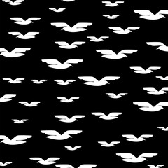 Birds in flight Seamless pattern isolated on black background