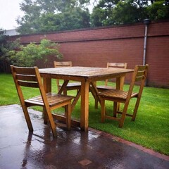 A high-resolution ultrarealistic image capturing a sudden downpour in a suburban backyard. The scene, a photograph, features a slightly tilted wooden table and chairs grouped against a brick wall on t