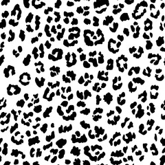 Fototapeta premium a black and white leopard print pattern with a white background