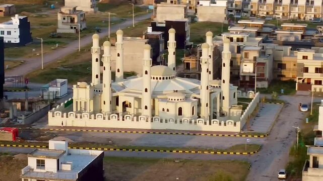 The stunning Jamia Masjid Hazrat Ali, known as the 8 Minar Mosque, standing prominently in MPCHS Multi Gardens B‑17 Islamabad.