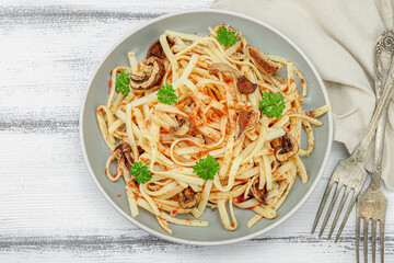 Plant based pasta with tomato sauce, herbs and cheese. Ready to eat healthy vegan food